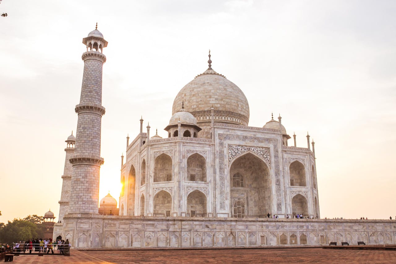 Stunning view of the Taj Mahal at sunset, highlighting its architectural beauty.